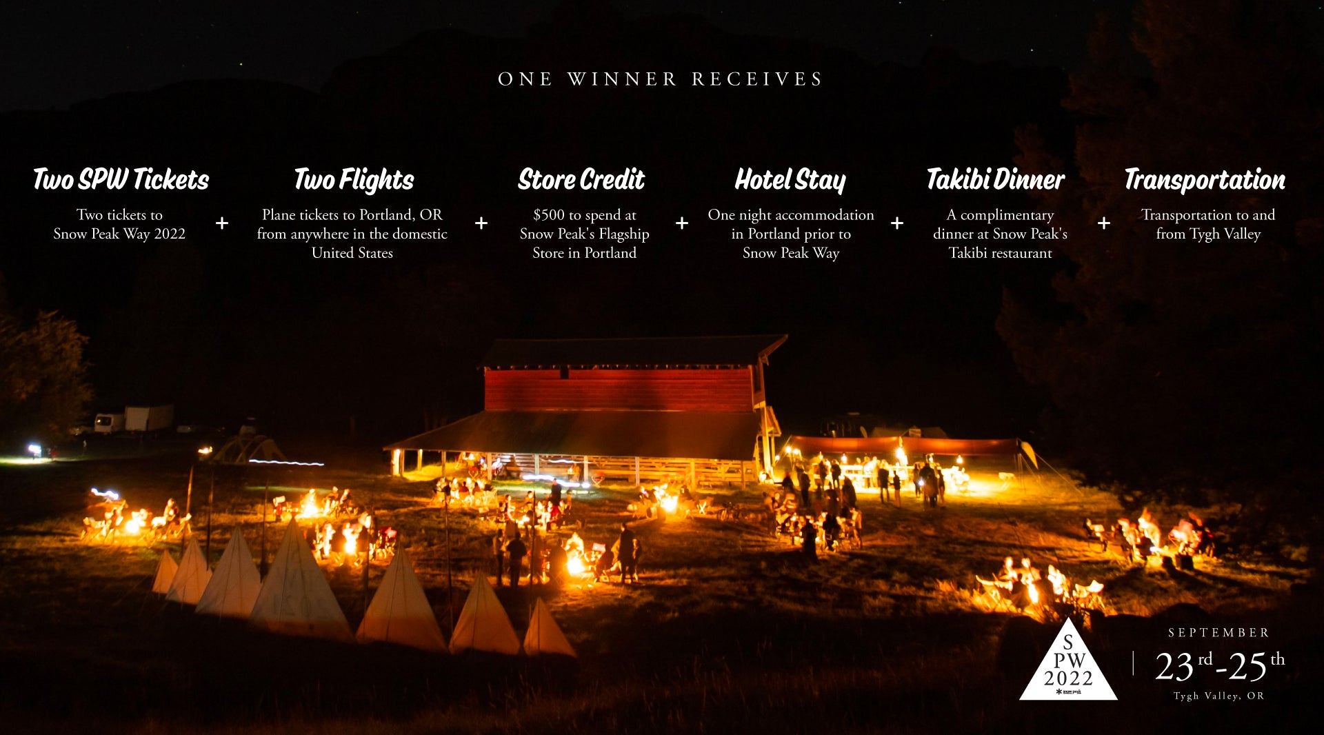 Nighttime view of the 2021 Snow Peak Way event with a large cabin surrounded by lit takibis.